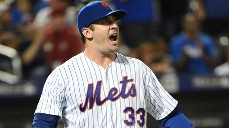 New York Mets starting pitcher Matt Harvey reacts