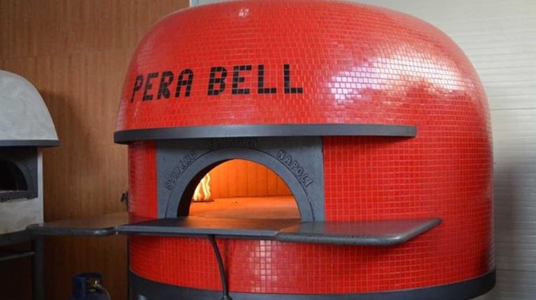 The wood-burning pizza oven at the new PeraBell