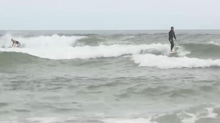 Surfers test the waters at Ditch Plains in
