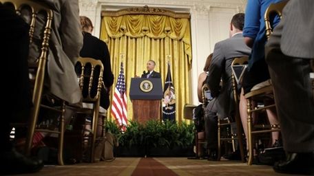 President Barack Obama answers questions about the Iran