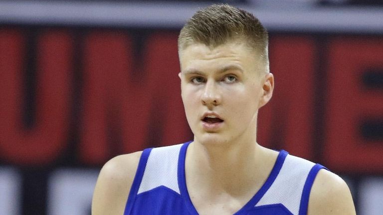 New York Knicks' Kristaps Porzingis plays in an