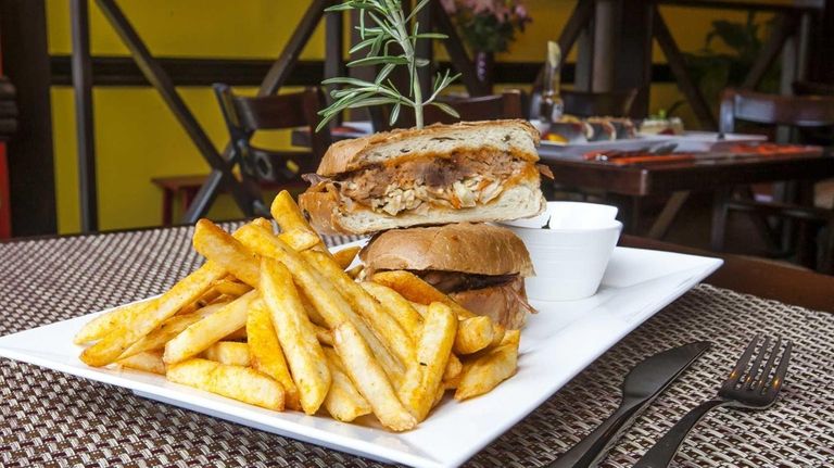 El Puerquito, a sumptuous pork sandwich, is served