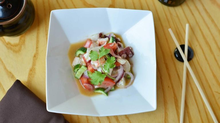 Mixed seafood ceviche cured in lime citrus at