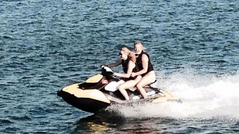Actresses Jennifer Lawrence, front, and Amy Schumer ride