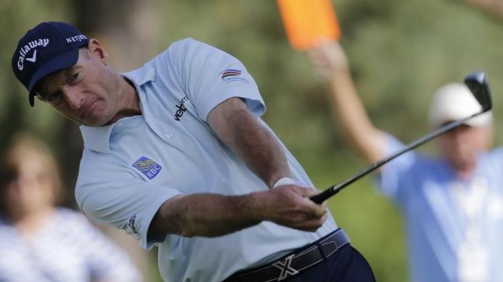 Jim Furyk tees off on the 12th hole