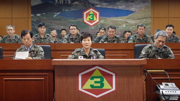 South Korean President Park Geun-hye, bottom center, presides