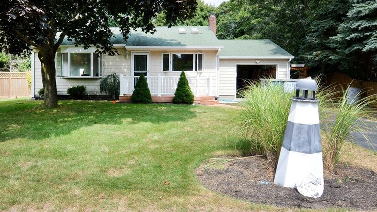 This starter home in Hampton Bays is listed