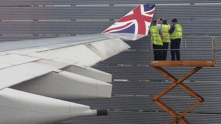 The wing of a London-bound Virgin Atlantic plane
