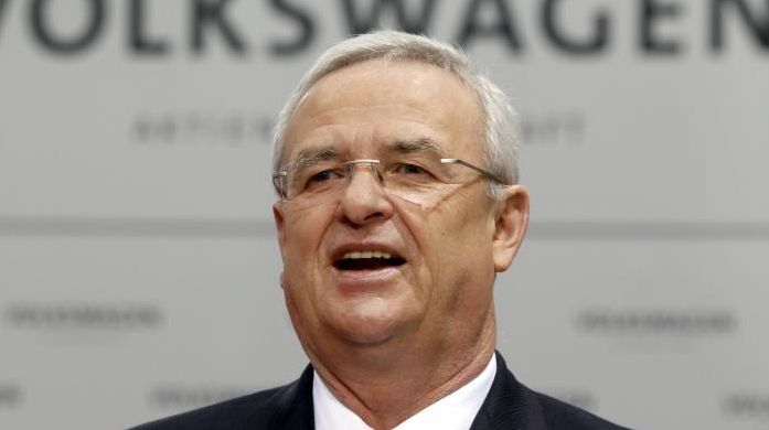 Volkswagen CEO Martin Winterkorn talks to the media
