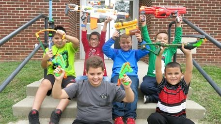 Kidsday reporters Angel Basilio, top left, Michael Cecere,