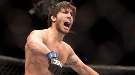 Elias Theodorou celebrates his win over Sheldon Wescott