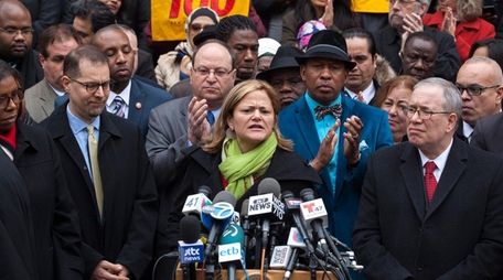 New York City Council Speaker Melissa Mark-Viverito, center,