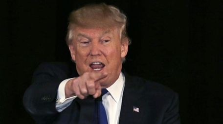 Republican presidential candidate Donald Trump gestures during an