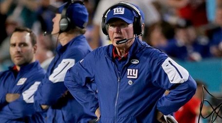 Giants coach Tom Coughlin took a big hit