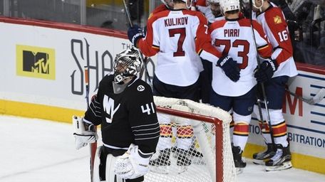 Islanders goalie Jaroslav Halak stands at the net