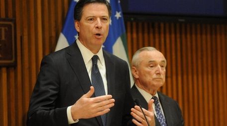 FBI Director James B. Comey, left, and NYPD