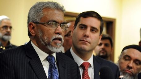 Nayyar Imam, left, chaplain of the Suffolk County