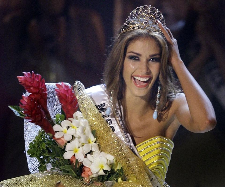 Dayana Mendoza, Miss Venezuela, reacts after winning the