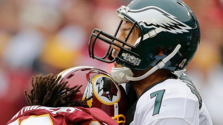 Eagles quarterback Sam Bradford takes a shot in