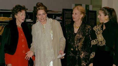Queen Noor of Jordan, second from left, and