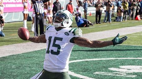 Jets wide receiver Brandon Marshall celebrates a touchdown