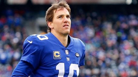 Despite missing the playoffs again, Eli Manning threw
