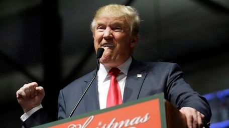 Republican presidential candidate Donald Trump addresses supporters at