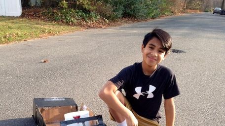 Kidsday reporter Ryan Sanders and the homemade car
