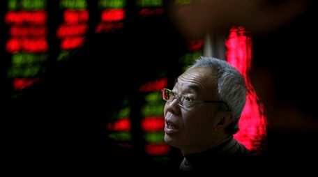 An investor in a brokerage house in Beijing,