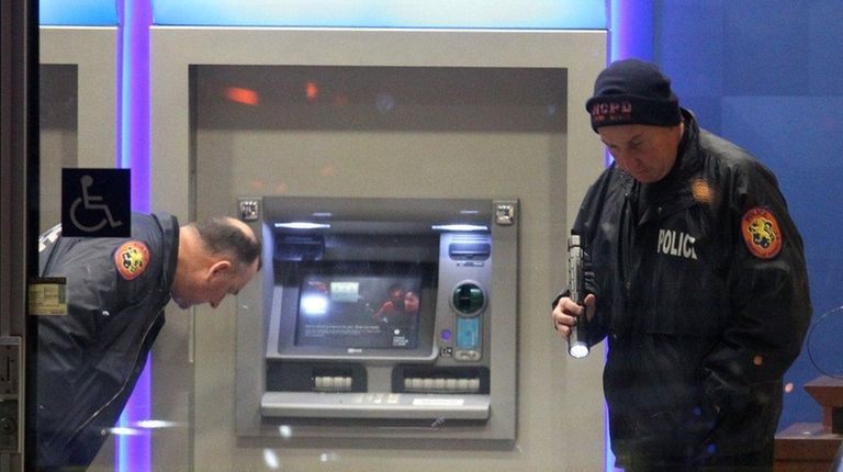 Nassau Police investigate a bank robbery with