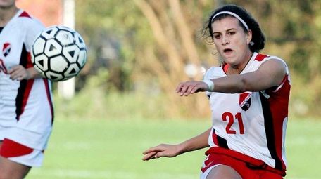 East Islip midfielder Cari Roccaro kicks the ball