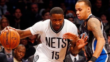 Donald Sloan of the Brooklyn Nets drives against