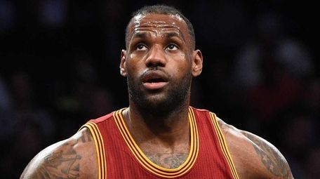 Cleveland Cavaliers forward LeBron James looks to rebound