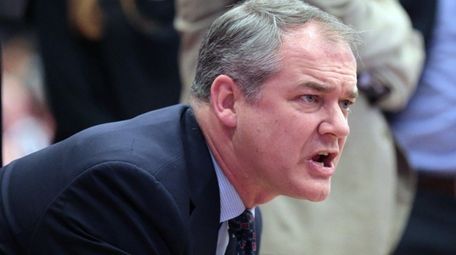 Stony Brook coach Steve Pikiell talks to his