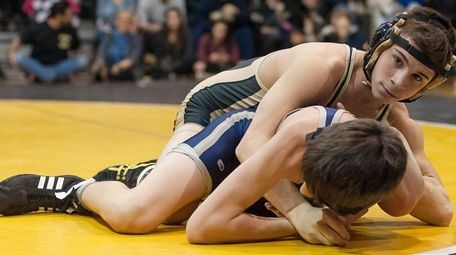 Wantagh's Michael Killard (top), controls Hewlett's Eddie O'tool