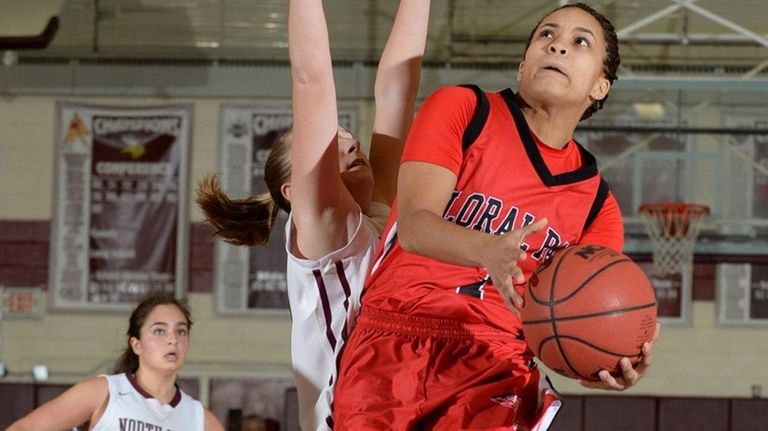 Floral Park's Kaela Hilaire (1) goes up for
