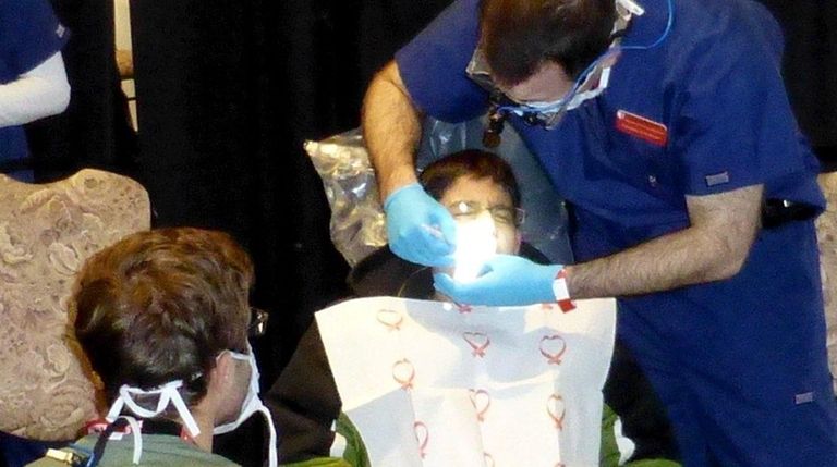Kids can receive free dental care during the
