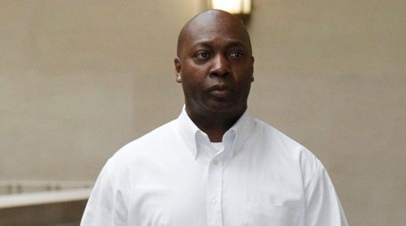 Francis Belizaire testifies at the trial for James