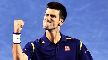 Novak Djokovic celebrates his win against Roger