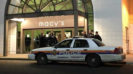 Nassau Police investigate an incident at Macy's in