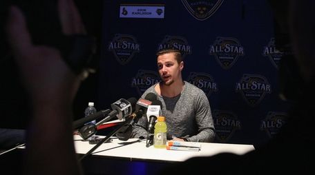 Erik Karlsson of the Ottawa Senators speaks during