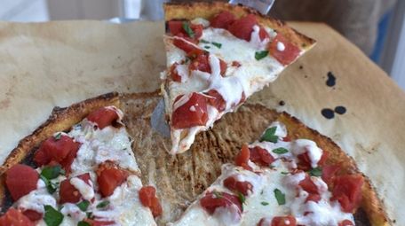 Pizza crust made with ground cauliflower is low