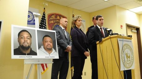 Suffolk County Police Commissioner Tim Sini, speaks about