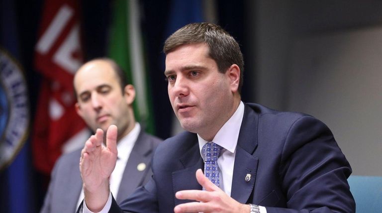 Acting Suffolk County Police Commissioner Tim Sini attends
