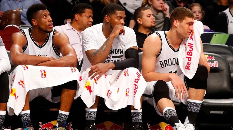 From left, Nets' Thaddeus Young, Joe Johnson and