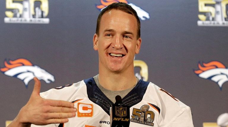 Denver Broncos quarterback Peyton Manning speaks to