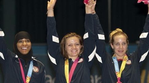 Ibtihaj Muhammad, Dagmara Wozniak and Mariel Zagunis of