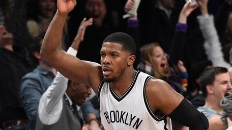 Brooklyn Nets forward Joe Johnson reacts after he