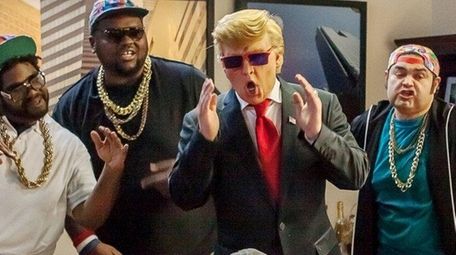 Johnny Depp, center, plays real estate mogul Donald