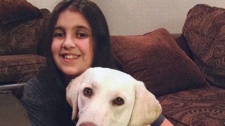 Kidsday reporter Amanda Perillo with her service dog,
